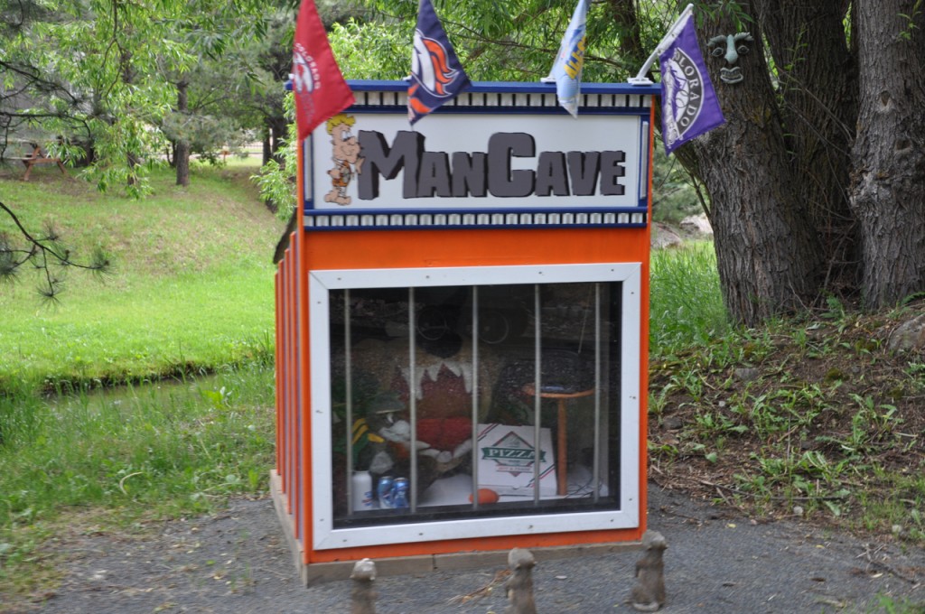 Bona Fide "Man Cave." Notice, not seen are homages to Pantani, Fausti, Coppi, Merckx, etc.