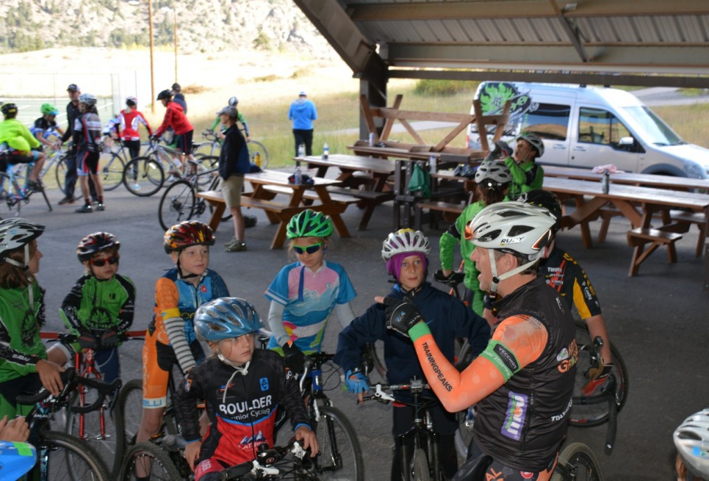 Coach Chris Cleveland briefs his group on the race 