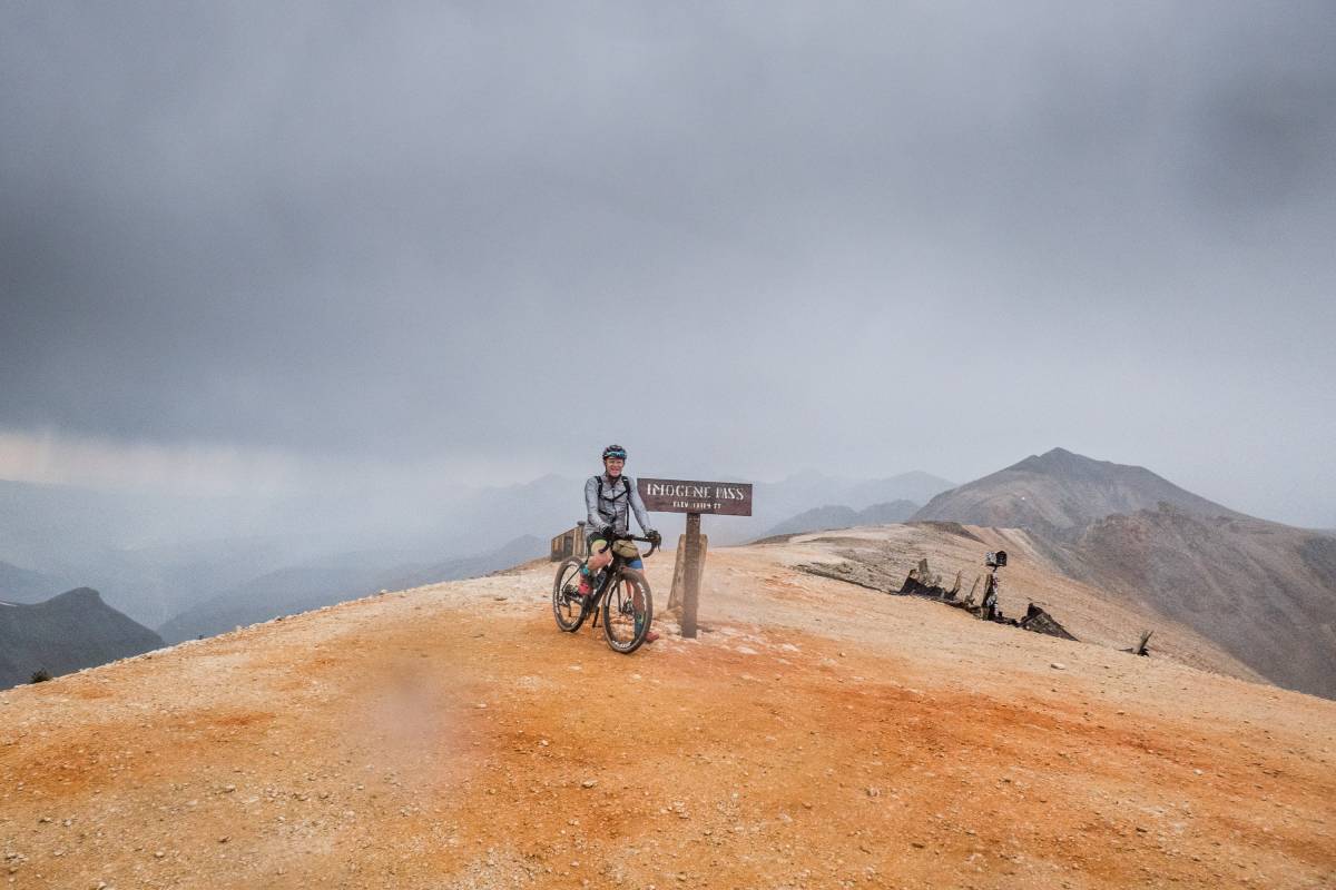 Peder on Imogene Pass. Summit by Bicycle.