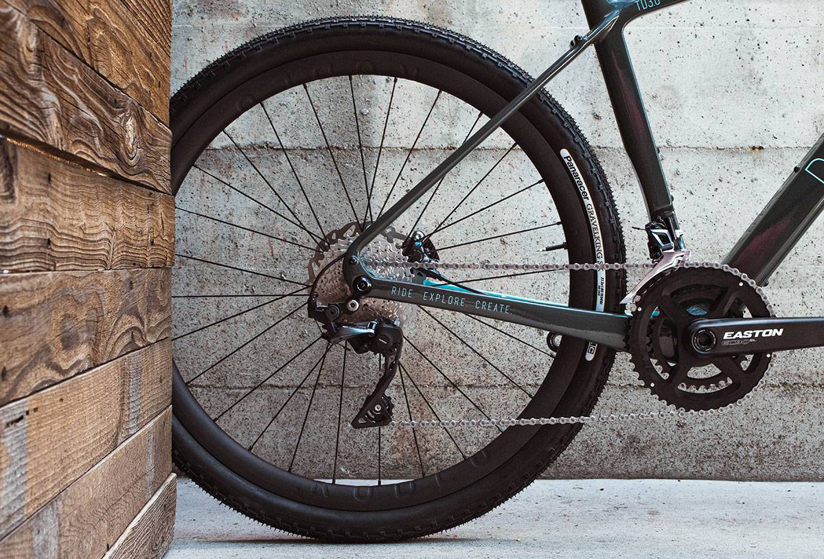 Photograph of a wheel in a gravel bike. Shows spacing of 650b tires in this frame