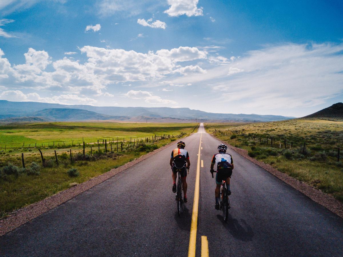 Two boys having fun and riding bikes