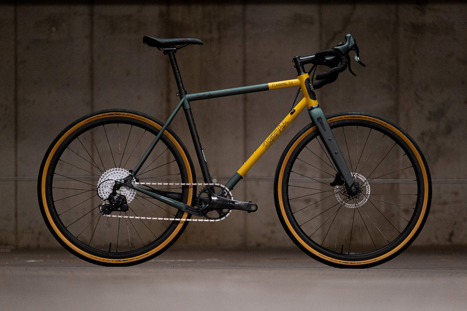 Yellow and green custom cerakote Rodeo Labs Flaanimal steel gravel bike.