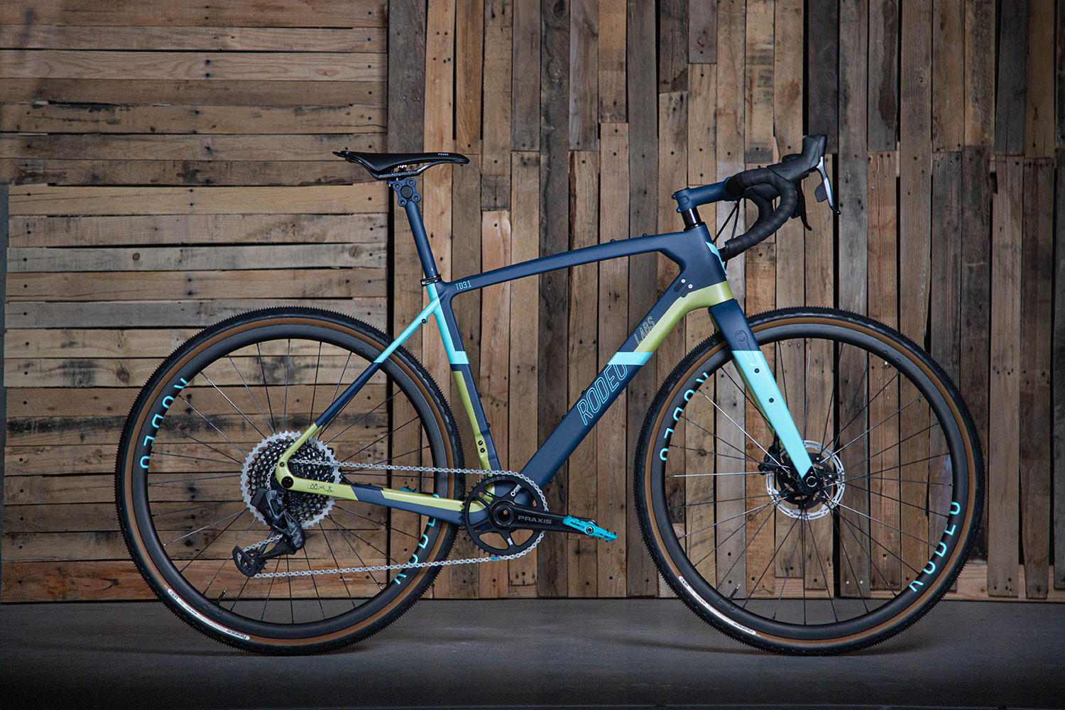 Blue and green custom cerakote painted Rodeo Labs Traildonkey carbon gravel bike.