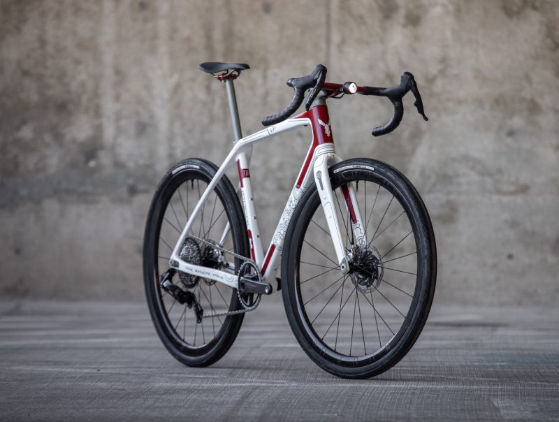 Star Wars themed bike. This bicycle is white and red with a Star Wars inspired design made to mimic the rebel fighter ships.